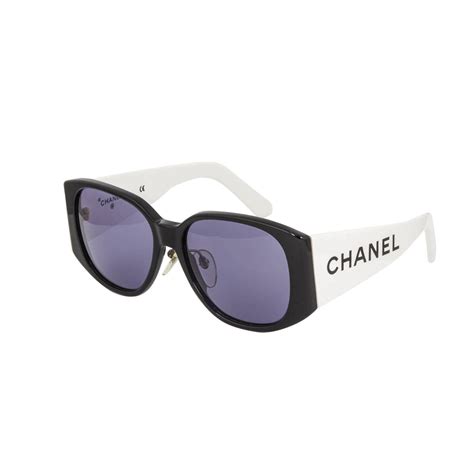 black chanel women& 39|Chanel black and white sunglasses.